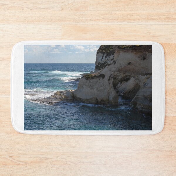 Item preview, Dramatic Coastal Cliff Over Turquoise Ocean Waves With Rocky Shoreline and Sea Spray designed and sold by Nmallia.