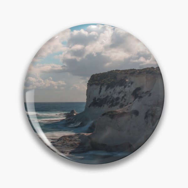 Item preview, Dramatic Coastal Cliff Over Turquoise Ocean Waves With Rocky Shoreline and Sea Spray designed and sold by Nmallia.