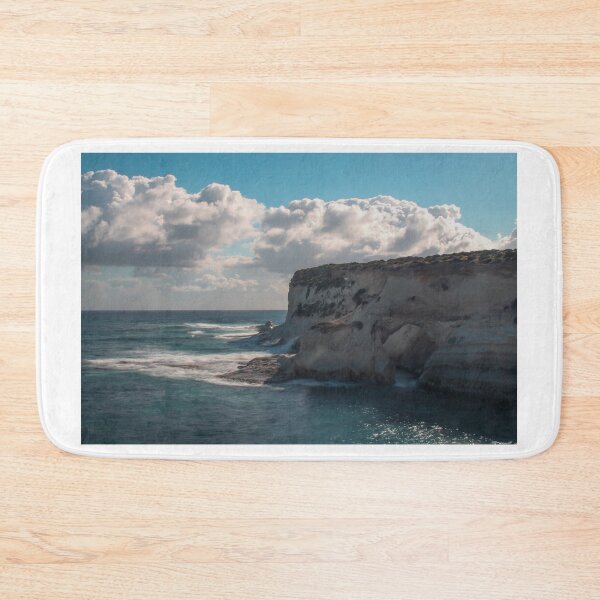 Item preview, Dramatic Coastal Cliff Over Turquoise Ocean Waves With Rocky Shoreline and Sea Spray designed and sold by Nmallia.