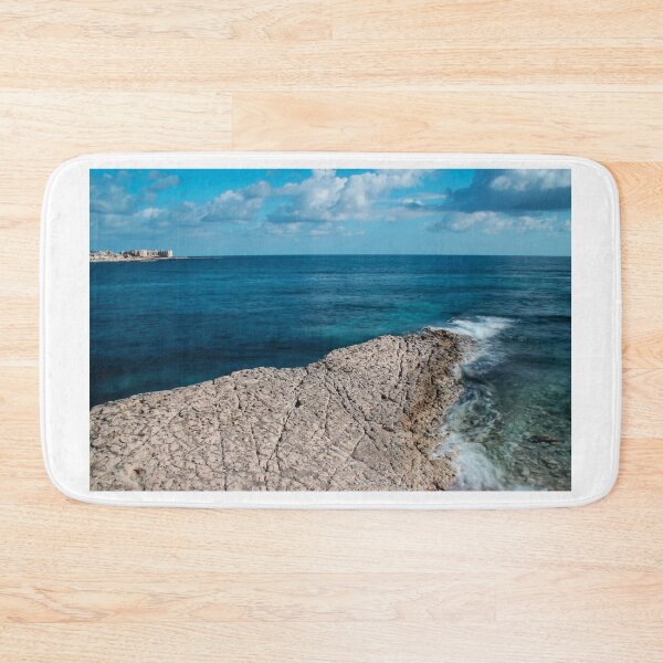 Item preview, Rocky Coastline With Waves Crashing on Shoreline and Clear Blue Sea designed and sold by Nmallia.
