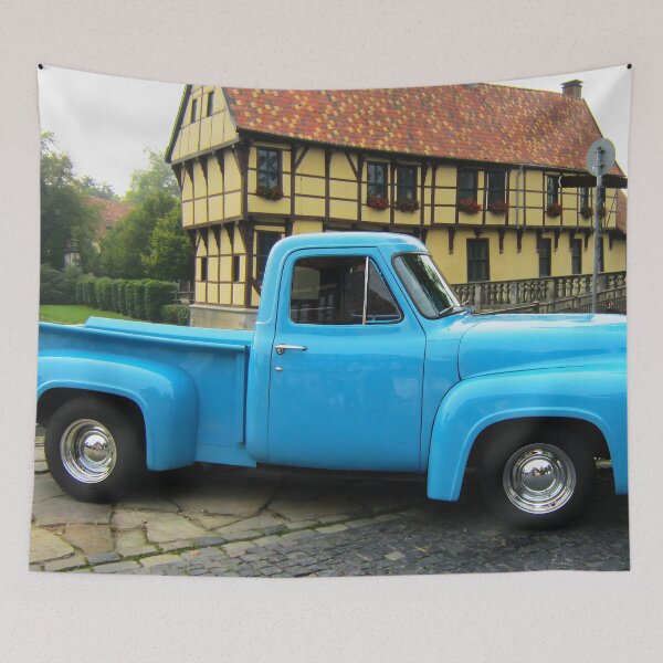 Item preview, 1955 Ford F-100 - Sky Blue Classic Pickup, American Truck in German Old Town designed and sold by Peter Kraaibeek | Generative Designs and Car Art.
