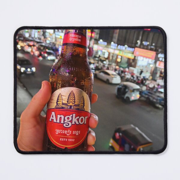 Item preview, Holding an Angkor beer bottle in Phnom Penh, Cambodia during a busy evening scene. designed and sold by Kevin Miller Photography.
