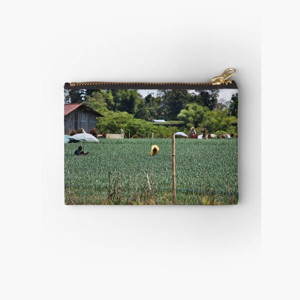 Item preview, Farmers sheltering under parasols in the field designed and sold by franck380.