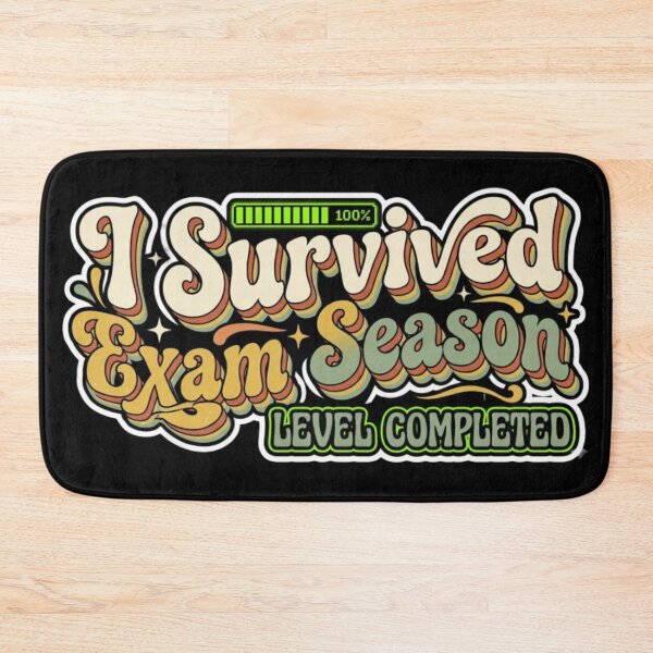 Item preview, I Survived Exam Season Level Completed – Retro Gamer Graduation Humor Shirt designed and sold by MartBook.