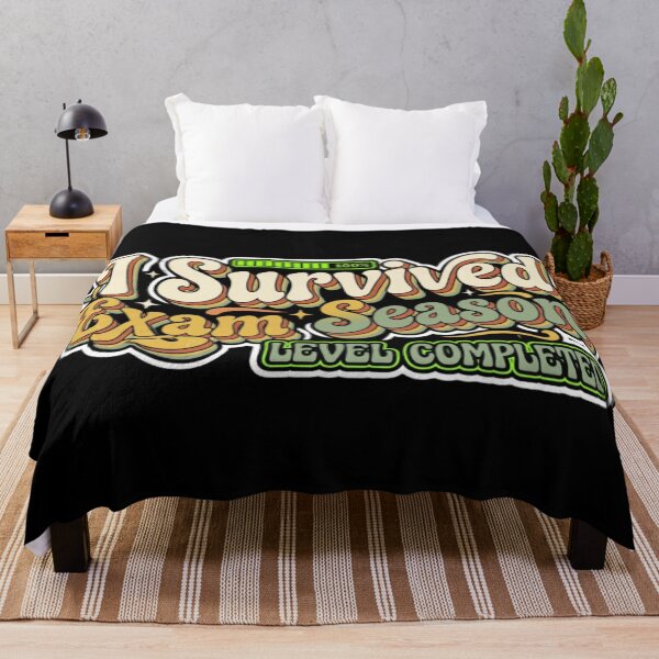 Item preview, I Survived Exam Season Level Completed – Retro Gamer Graduation Humor Shirt designed and sold by MartBook.