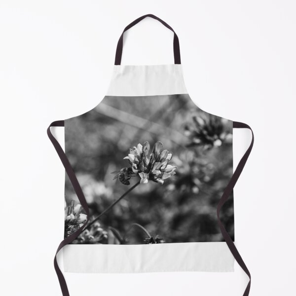 Item preview, Monochrome Close-Up of Bee Pollinating Clover Flower in Wild Meadow With Soft Bokeh designed and sold by Nmallia.