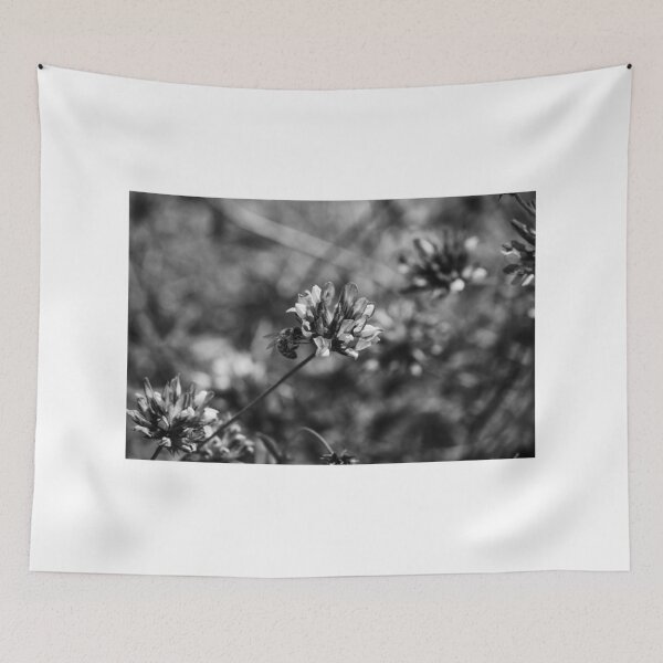 Item preview, Monochrome Close-Up of Bee Pollinating Clover Flower in Wild Meadow With Soft Bokeh designed and sold by Nmallia.