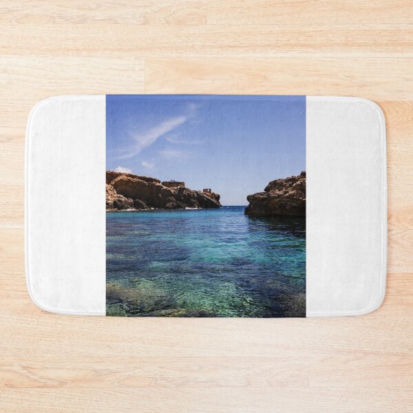 Item preview, Turquoise Mediterranean Coastline With Rocky Cliffs, Clear Water And Sunlit Seascape For Travel designed and sold by Nmallia.