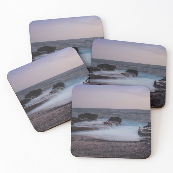 Item preview, Long Exposure Seascape At Rocky Coast With Misty Waves And Pastel Twilight Sky Over Ocean designed and sold by Nmallia.