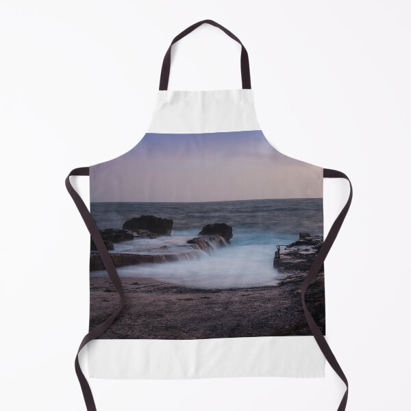 Item preview, Long Exposure Seascape At Rocky Coast With Misty Waves And Pastel Twilight Sky Over Ocean designed and sold by Nmallia.
