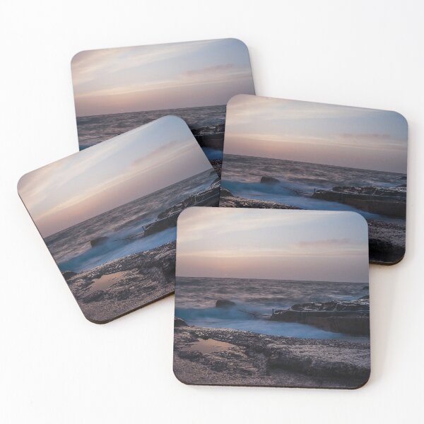 Item preview, Long Exposure Seascape At Rocky Coast With Misty Waves And Pastel Twilight Sky Over Ocean designed and sold by Nmallia.