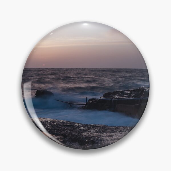 Item preview, Long Exposure Seascape At Rocky Coast With Misty Waves And Pastel Twilight Sky Over Ocean designed and sold by Nmallia.