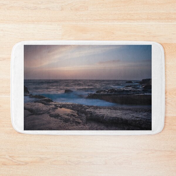 Item preview, Long Exposure Seascape At Rocky Coast With Misty Waves And Pastel Twilight Sky Over Ocean designed and sold by Nmallia.