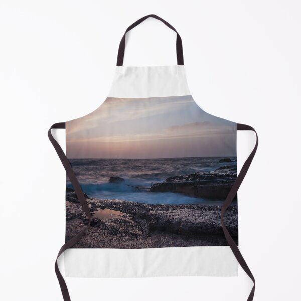 Item preview, Long Exposure Seascape At Rocky Coast With Misty Waves And Pastel Twilight Sky Over Ocean designed and sold by Nmallia.