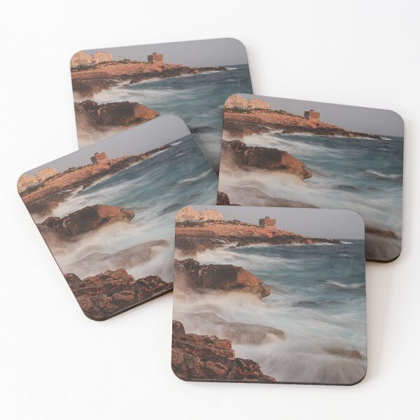 Item preview,  Rocky Coastline With Waves Crashing Against Cliffs Near A Seaside Village At Dusk designed and sold by Nmallia.