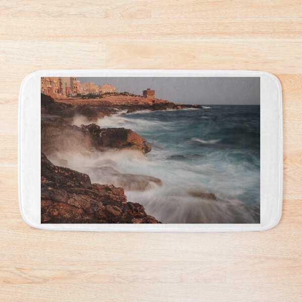 Item preview,  Rocky Coastline With Waves Crashing Against Cliffs Near A Seaside Village At Dusk designed and sold by Nmallia.