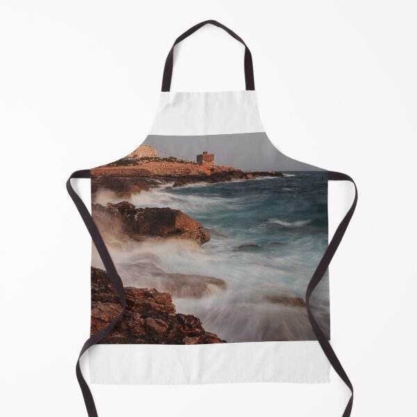 Item preview, Rocky Coastline With Waves Crashing Against Cliffs Near A Seaside Village At Dusk designed and sold by Nmallia.