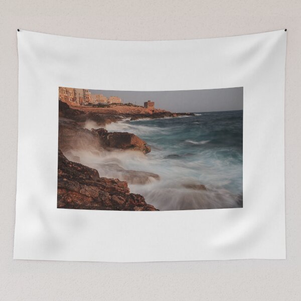 Item preview,  Rocky Coastline With Waves Crashing Against Cliffs Near A Seaside Village At Dusk designed and sold by Nmallia.