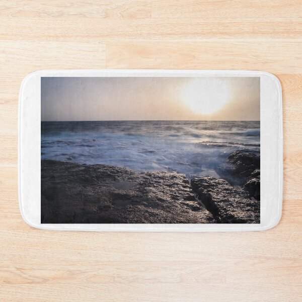 Item preview,  Rocky Coastline With Waves Crashing Against Cliffs Near A Seaside Village At Dusk designed and sold by Nmallia.