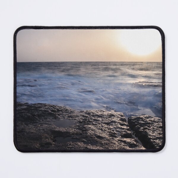 Item preview, Rocky Coastline With Waves Crashing Against Cliffs Near A Seaside Village At Dusk designed and sold by Nmallia.