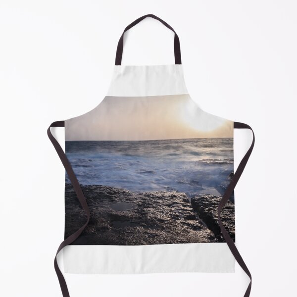 Item preview, Rocky Coastline With Waves Crashing Against Cliffs Near A Seaside Village At Dusk designed and sold by Nmallia.