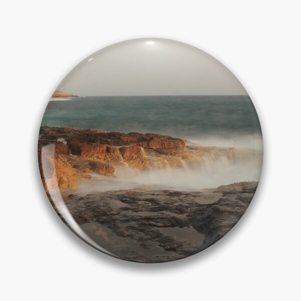 Item preview, Rocky Coastline With Waves Crashing Against Cliffs Near A Seaside Village At Dusk designed and sold by Nmallia.