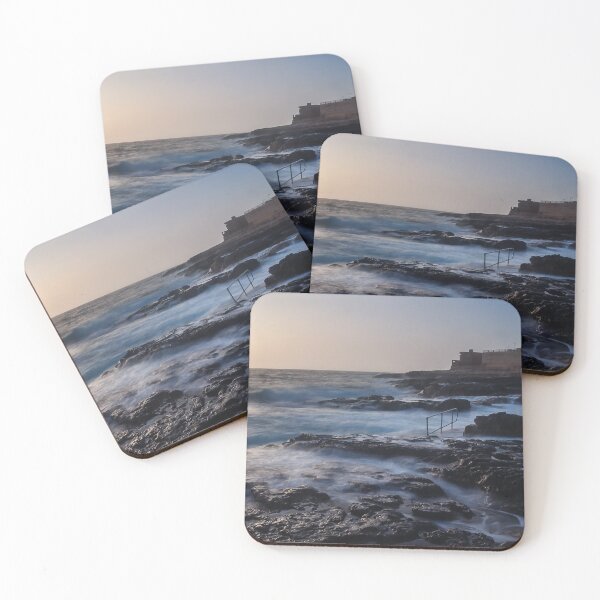 Item preview, Rocky Coastline With Waves Crashing Against Cliffs Near A Seaside Village At Dusk designed and sold by Nmallia.