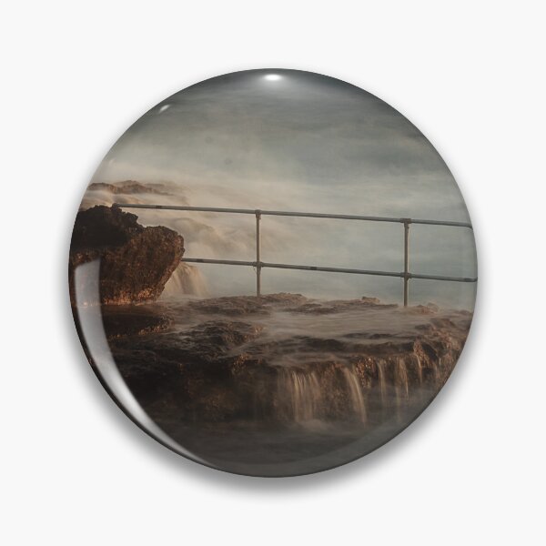 Item preview, Rocky Coastline With Waves Crashing Against Cliffs Near A Seaside Village At Dusk designed and sold by Nmallia.