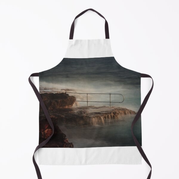 Item preview, Rocky Coastline With Waves Crashing Against Cliffs Near A Seaside Village At Dusk designed and sold by Nmallia.