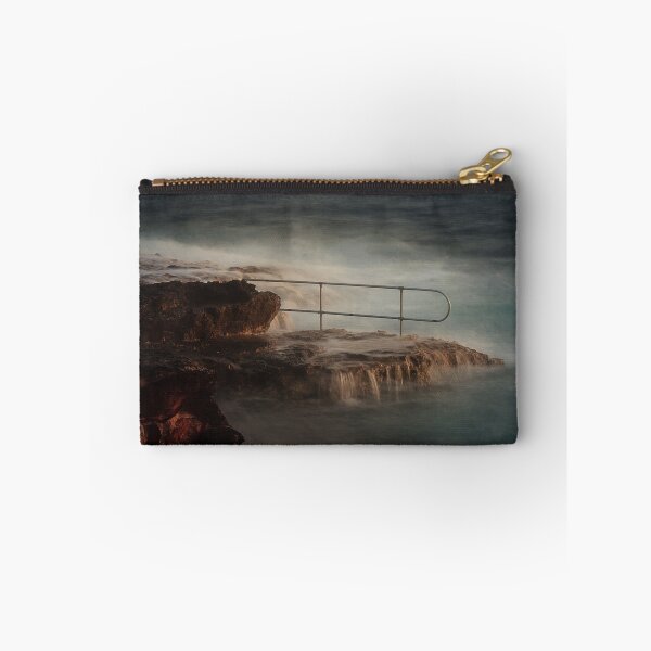 Item preview, Rocky Coastline With Waves Crashing Against Cliffs Near A Seaside Village At Dusk designed and sold by Nmallia.