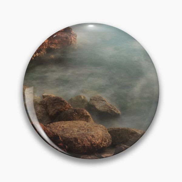 Item preview, Rocky Coastline With Waves Crashing Against Cliffs Near A Seaside Village At Dusk designed and sold by Nmallia.