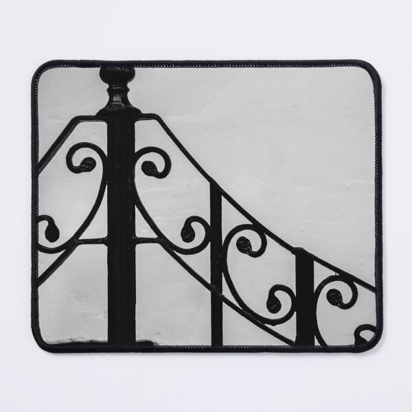 Item preview, Black Wrought-Iron Gate With Scrollwork Against White Plastered Wall Minimal Architectural Detail designed and sold by Nmallia.