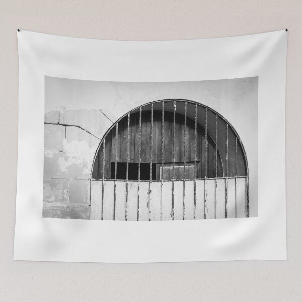Item preview, Aged Arched Gate With Vertical Bars And Weathered Wall In Black And White designed and sold by Nmallia.