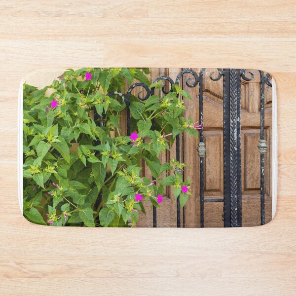 Item preview, Pink Garden Flowers Climbing Wrought Iron Gate Beside Rustic Wooden Door Entrance designed and sold by Nmallia.