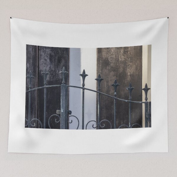 Item preview, Vintage Iron Gate With Ornate Fleur-De-Lis Finials in Front of Weathered Wooden Doors designed and sold by Nmallia.
