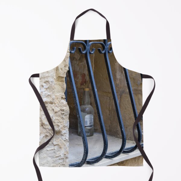 Item preview, Abandoned Glass Bottle Behind Iron Bars In Stone Window Alcove In Urban Nook designed and sold by Nmallia.