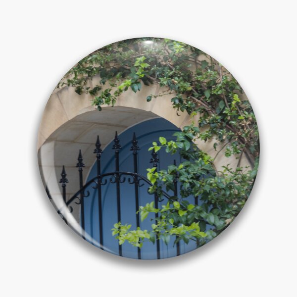 Item preview, Blue Arched Door With Wrought Iron Gate and Climbing Bougainvillea on Stone Wall designed and sold by Nmallia.