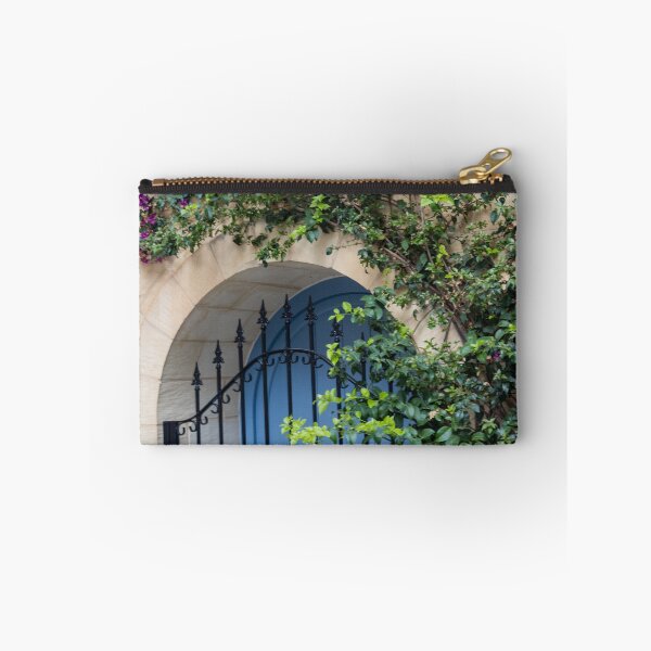 Item preview, Blue Arched Door With Wrought Iron Gate and Climbing Bougainvillea on Stone Wall designed and sold by Nmallia.