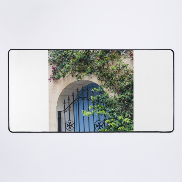 Item preview, Blue Arched Door With Wrought Iron Gate and Climbing Bougainvillea on Stone Wall designed and sold by Nmallia.