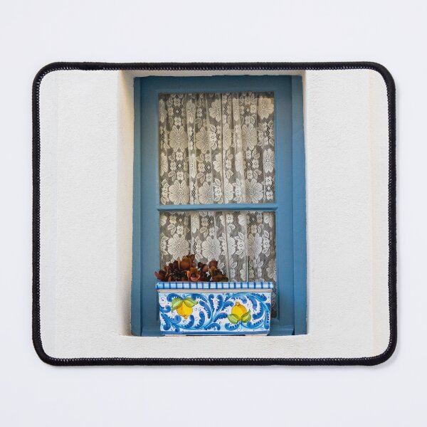 Item preview, Blue Framed Window With Lace Curtains And Decorative Ceramic Flowerpot On White Mediterranean Wall designed and sold by Nmallia.