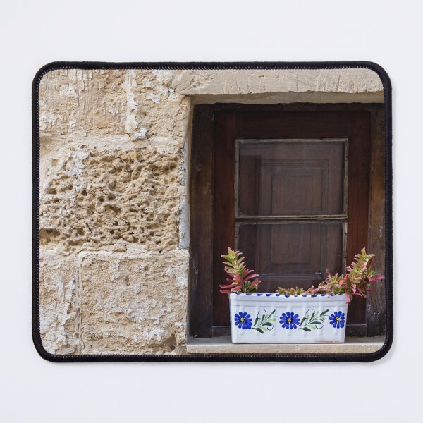 Item preview, Sunlit Stone Building Wooden Window With Colorful Flower Boxes On Mediterranean Facade designed and sold by Nmallia.