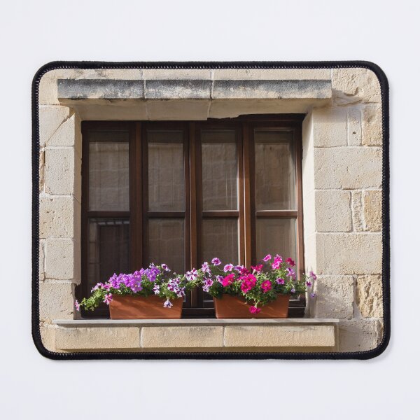 Item preview, Sunlit Stone Building Wooden Window With Colorful Flower Boxes On Mediterranean Facade designed and sold by Nmallia.