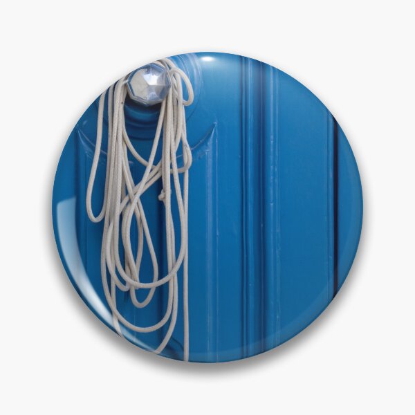 Item preview, Coiled White Rope Hanging on Shiny Doorknob Against Bright Blue Decorative Panel Door designed and sold by Nmallia.