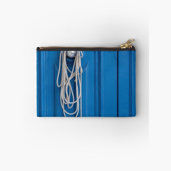 Item preview, Coiled White Rope Hanging on Shiny Doorknob Against Bright Blue Decorative Panel Door designed and sold by Nmallia.