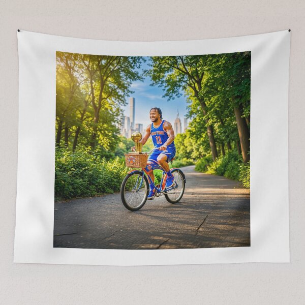 Item preview, Jalen Brunson Riding His Bicycle With MVP Trophy designed and sold by Home Decor Art.