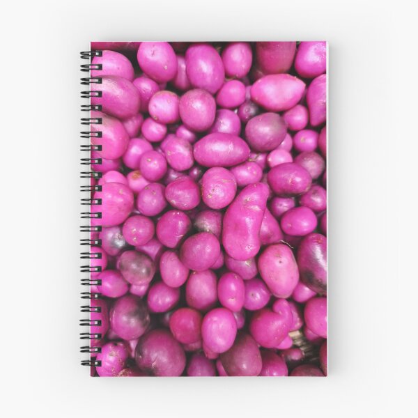 Item preview, Full frame of raw purple native potatoes or chuguas at a traditional South American market designed and sold by ElementoVisual.
