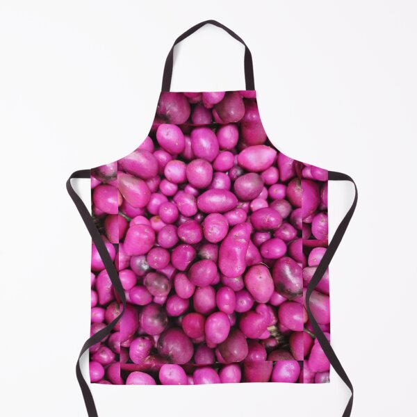 Item preview, Full frame of raw purple native potatoes or chuguas at a traditional South American market designed and sold by ElementoVisual.