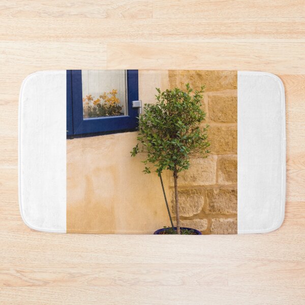 Item preview, Potted Tree in Blue Pot Beside Blue Window and Sandstone Wall — Mediterranean Home Exterior Scene designed and sold by Nmallia.