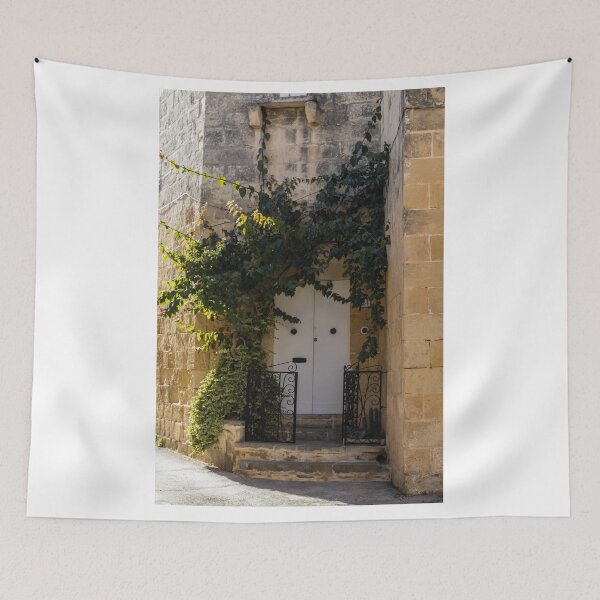 Item preview, Sunlit Ivy-Covered White Door in Warm Stone Alleyway With Wrought Iron Gate and Steps designed and sold by Nmallia.
