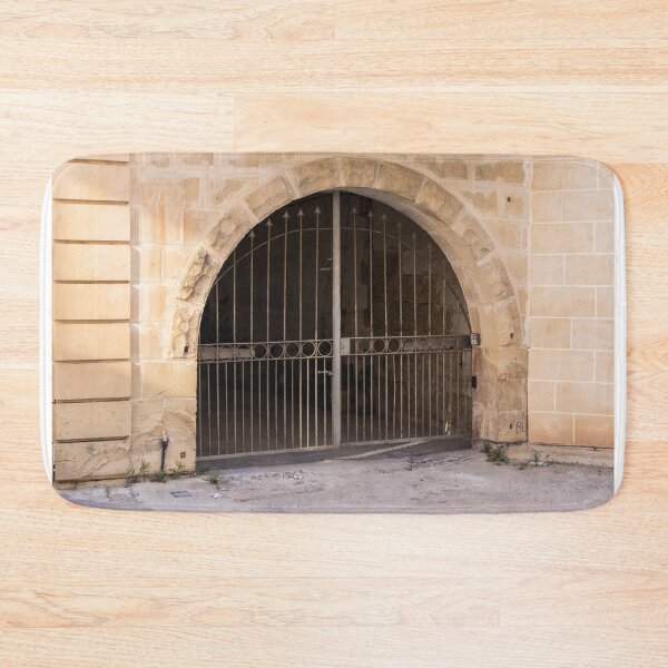 Item preview, Wrought Iron Gate and Stone Arch Entrance of Historic Limestone Building With Arched Doorway designed and sold by Nmallia.